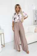 Women's jumpsuit with wide beige pants and floral top - Wiki