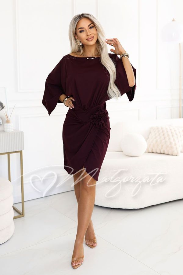 Plum-coloured formal dress with wide sleeves and a flower – Noelia